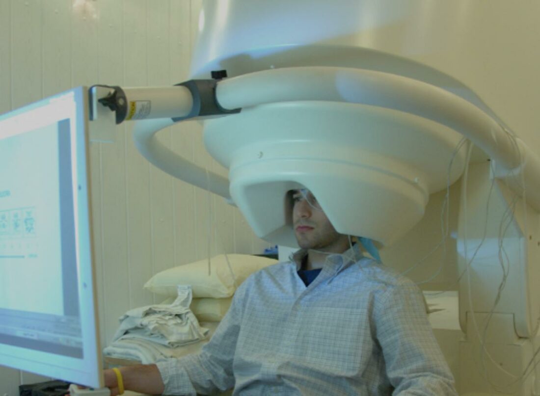 Magnetoencephalography uses a SQUID device and computer to measure brain neuron activity's magnetic fields and overlay the results on a brain image. (From: Wikipedia)