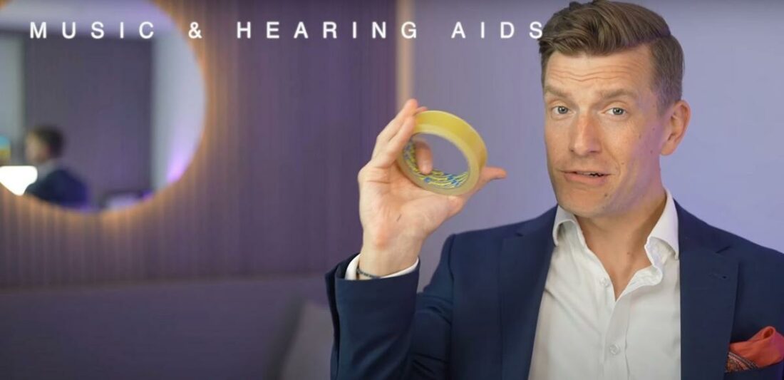 Matthew Allsop explaining the budget-friendly trick to improve music quality in hearing aids. (From: YouTube/HearingTracker)